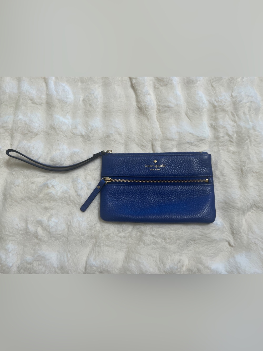 kate spade cobalt blue pebbled leather wristlet clutch